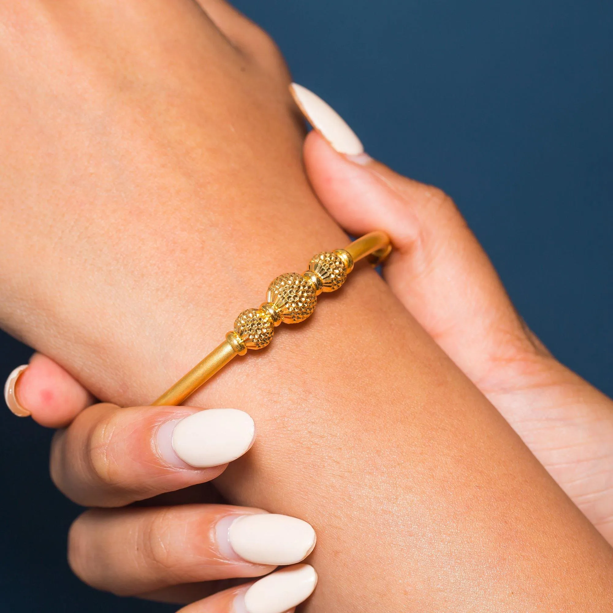 22K Yellow Gold Bangle W/ 3 Accent Dimpled Balls